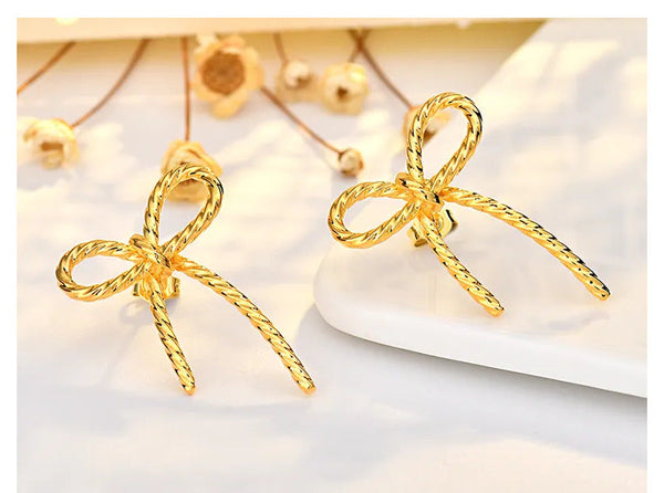 PREORDER: Twisted Bow Earrings 8.10.26 OSYM