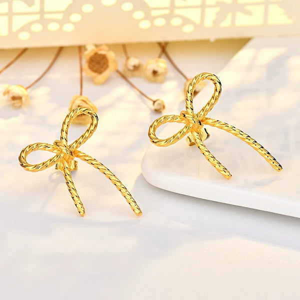 PREORDER: Twisted Bow Earrings 8.10.26 OSYM