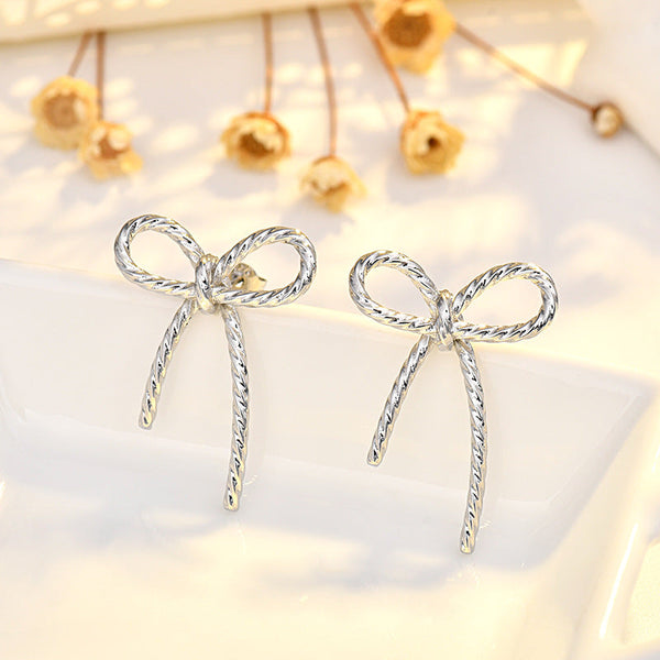 PREORDER: Twisted Bow Earrings 8.10.26 OSYM