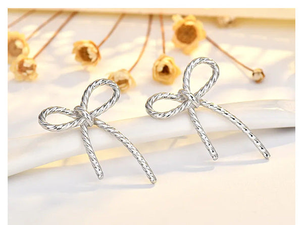 PREORDER: Twisted Bow Earrings 8.10.26 OSYM